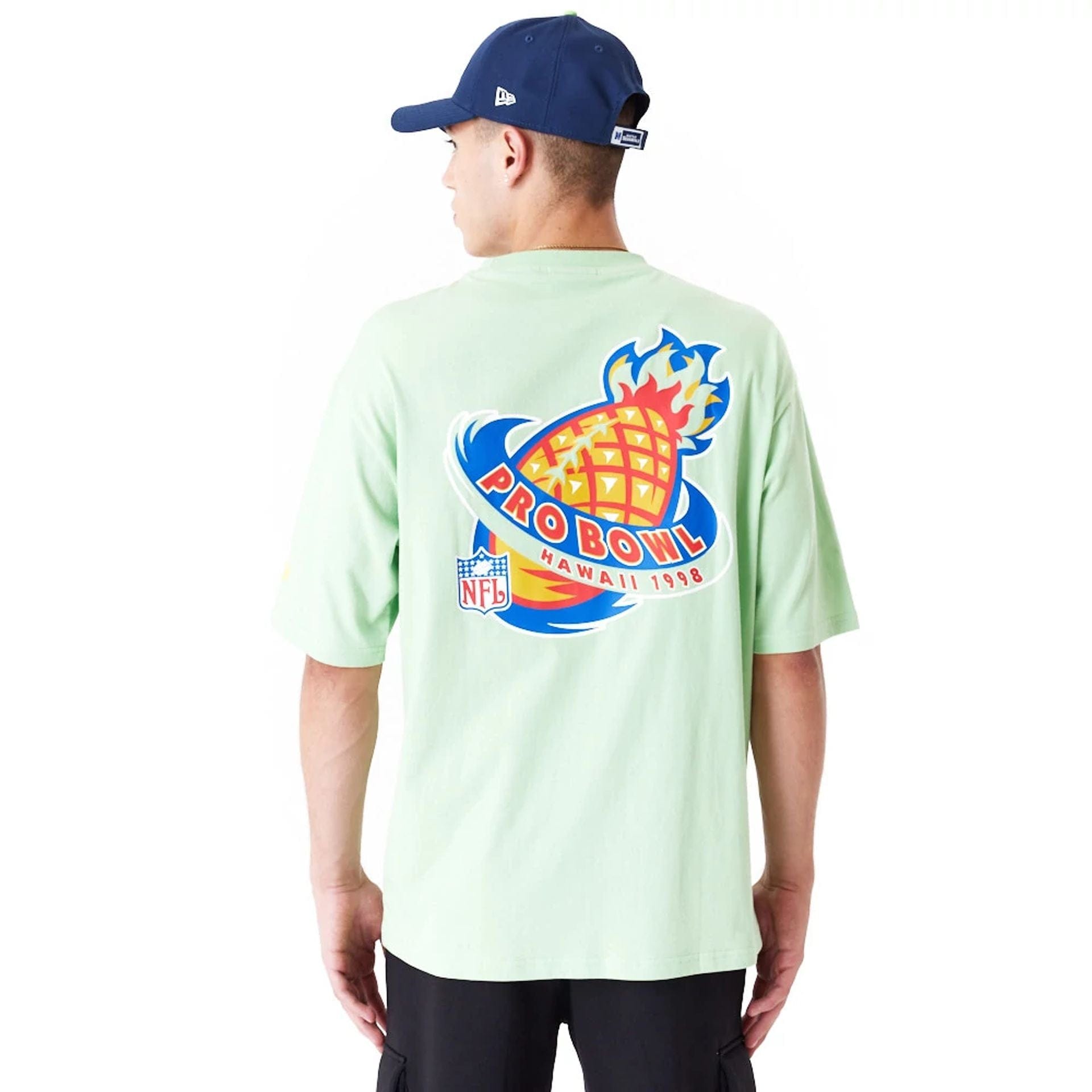 The Male model is wearing NFL Pro Bowl Hawaii NFC Graphic Bright Green Oversized T-Shirt 5