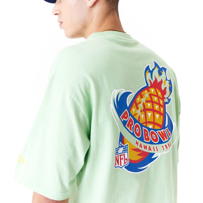 The Male model is wearing NFL Pro Bowl Hawaii NFC Graphic Bright Green Oversized T-Shirt 3