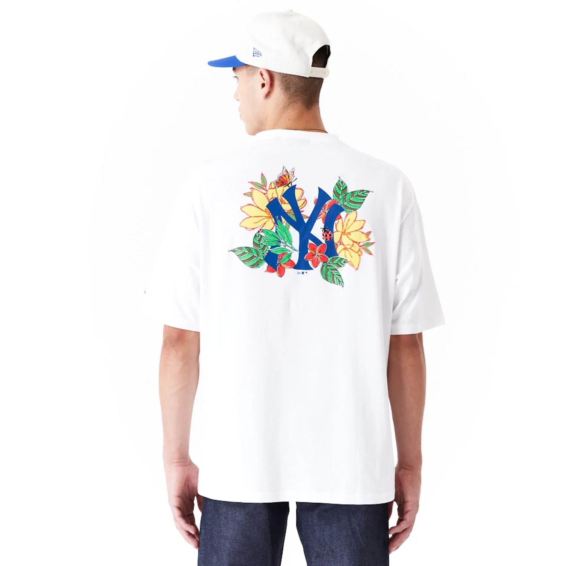 The Male model is wearing New York Yankees MLB Floral Graphic White Oversized T-Shirt 2