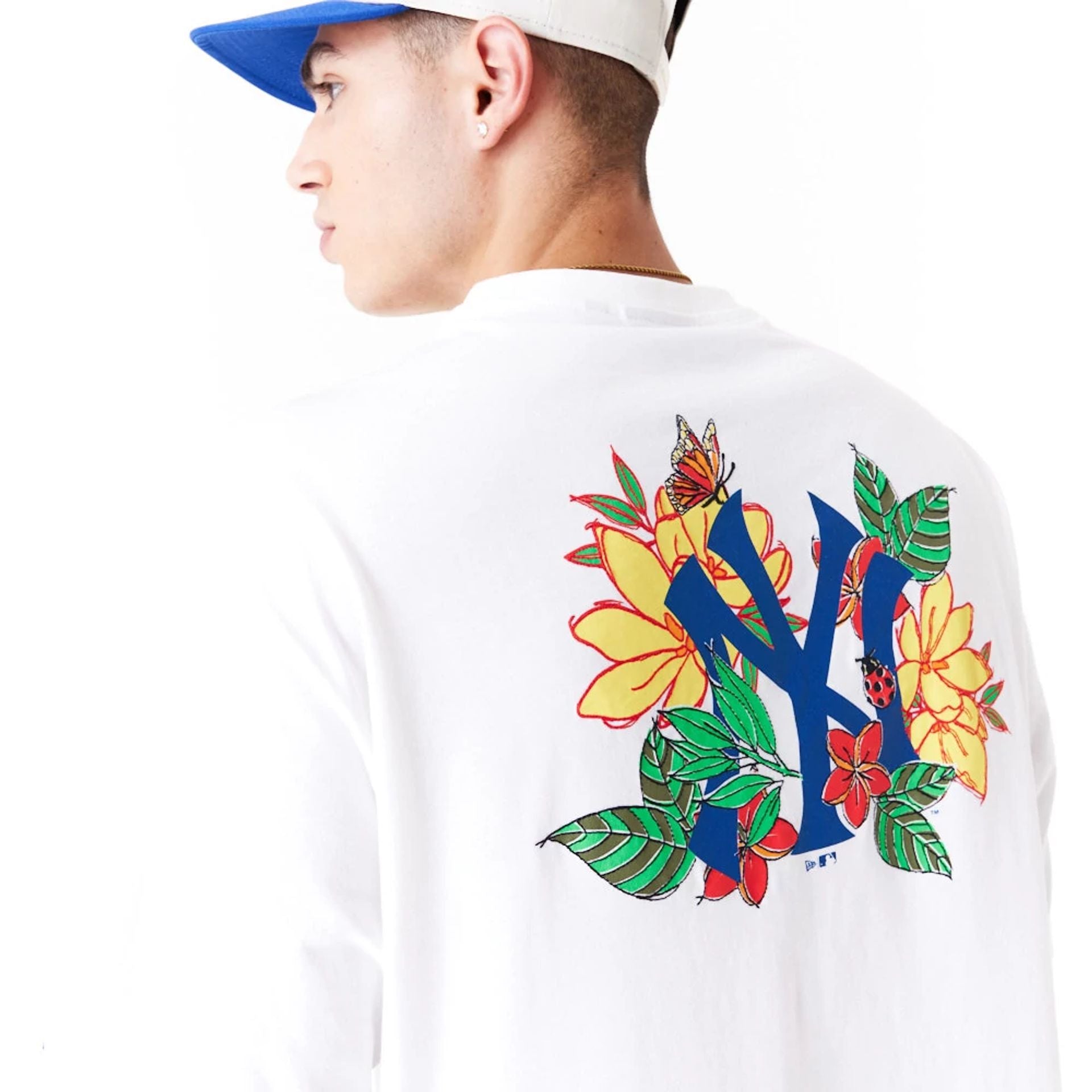 The Male model is wearing New York Yankees MLB Floral Graphic White Oversized T-Shirt 6