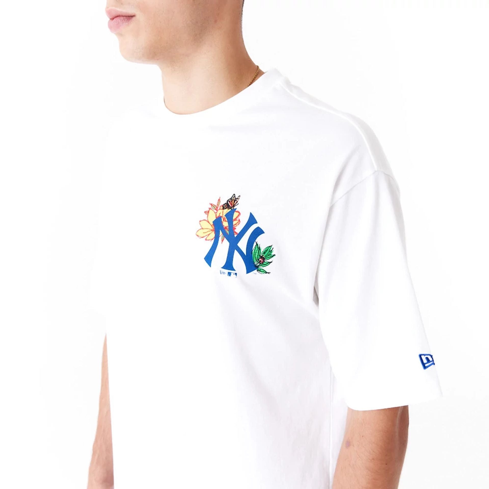 The Male model is wearing New York Yankees MLB Floral Graphic White Oversized T-Shirt 7