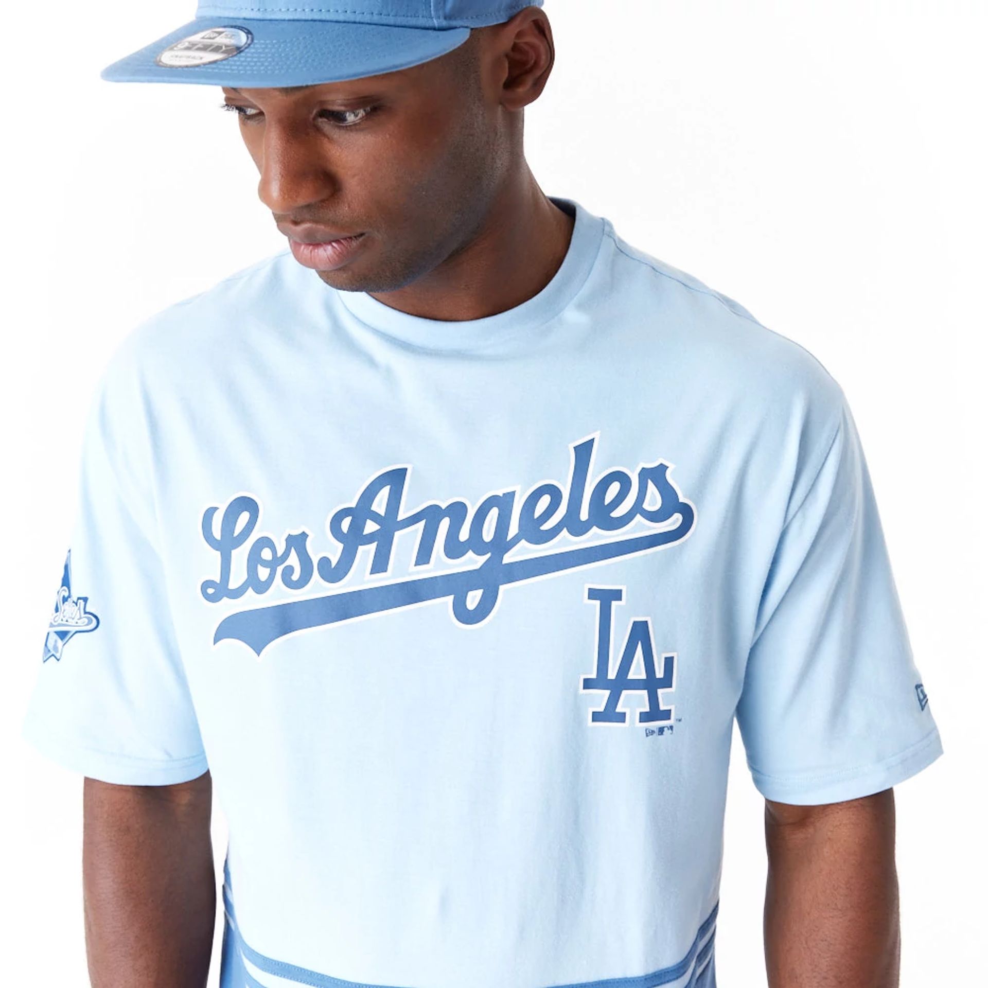 The Male model is wearing LA Dodgers World Series Pastel Blue Oversized T-Shirt 2