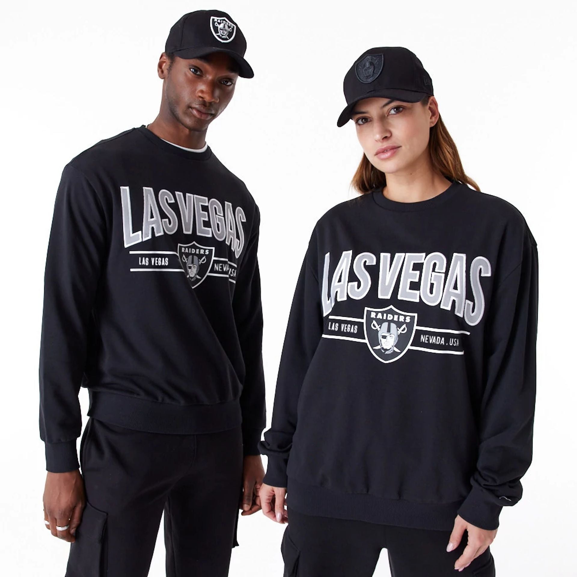 The Male model is wearing Las Vegas Raiders NFL Wordmark Black Crew Neck Sweatshirt 1