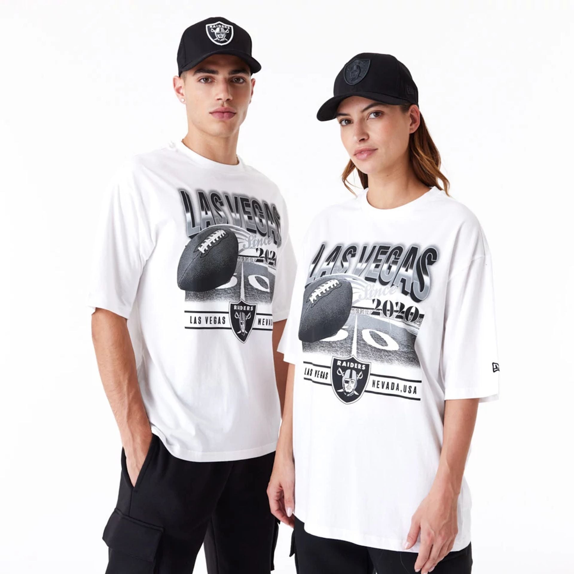 The Male model is wearing Las Vegas Raiders NFL Team Graphic White Oversized T-Shirt 1