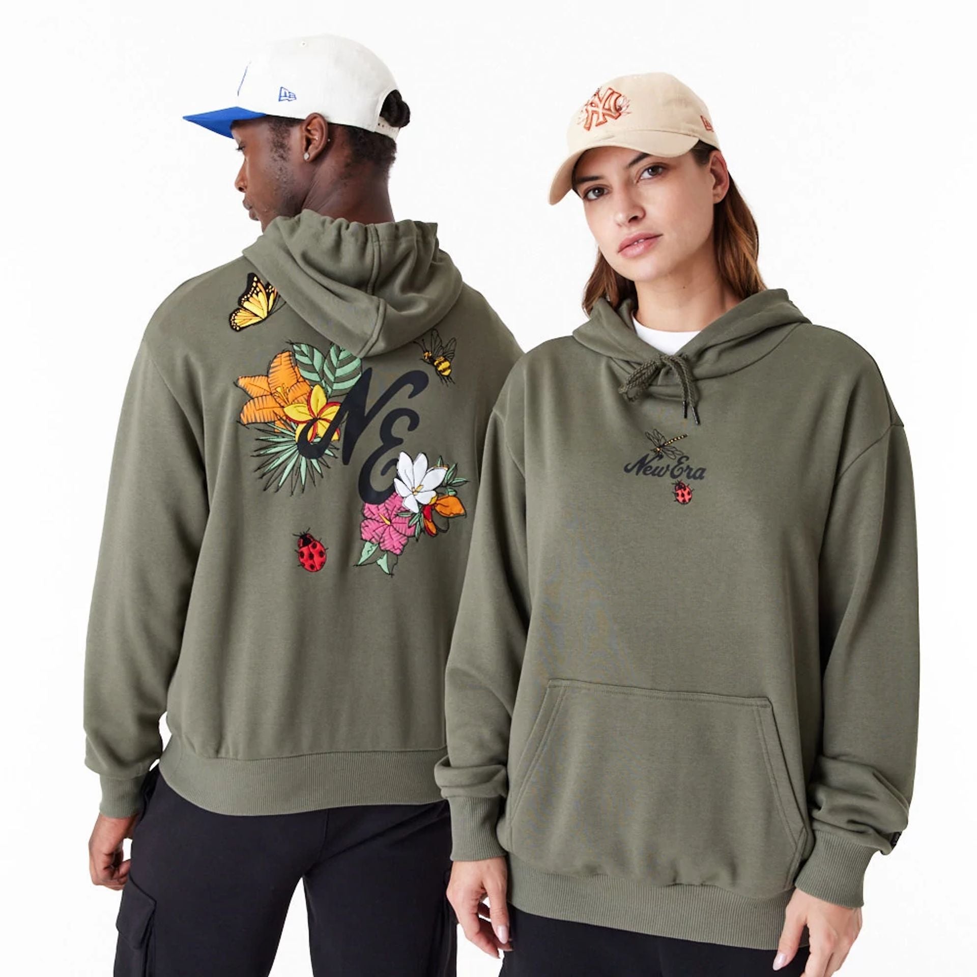 The Male model is wearing New Era Floral Graphic Green Oversized Pullover Hoodie 1