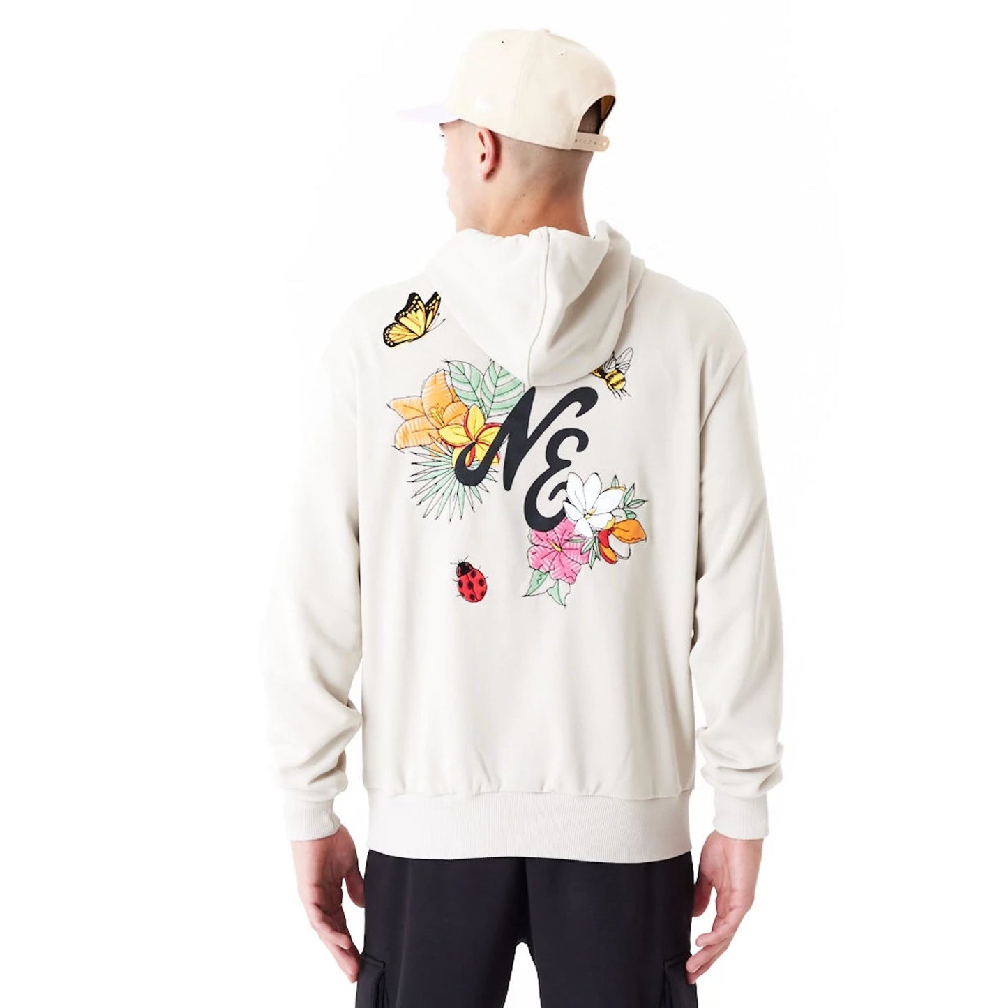 The Male model is wearing New Era Floral Graphic Stone Oversized Pullover Hoodie 4