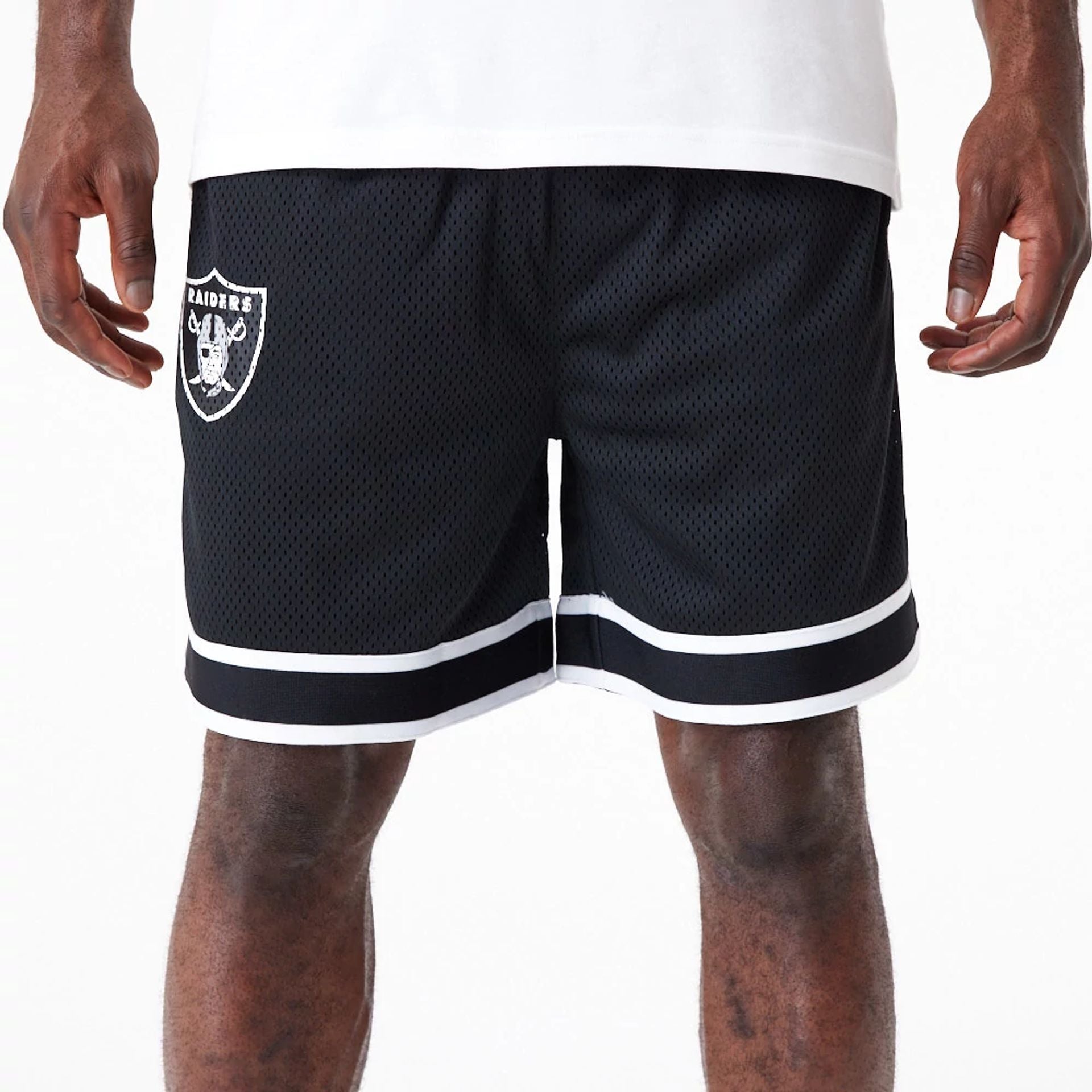 The Male model is wearing Las Vegas Raiders NFL Colour Block Black Shorts 4