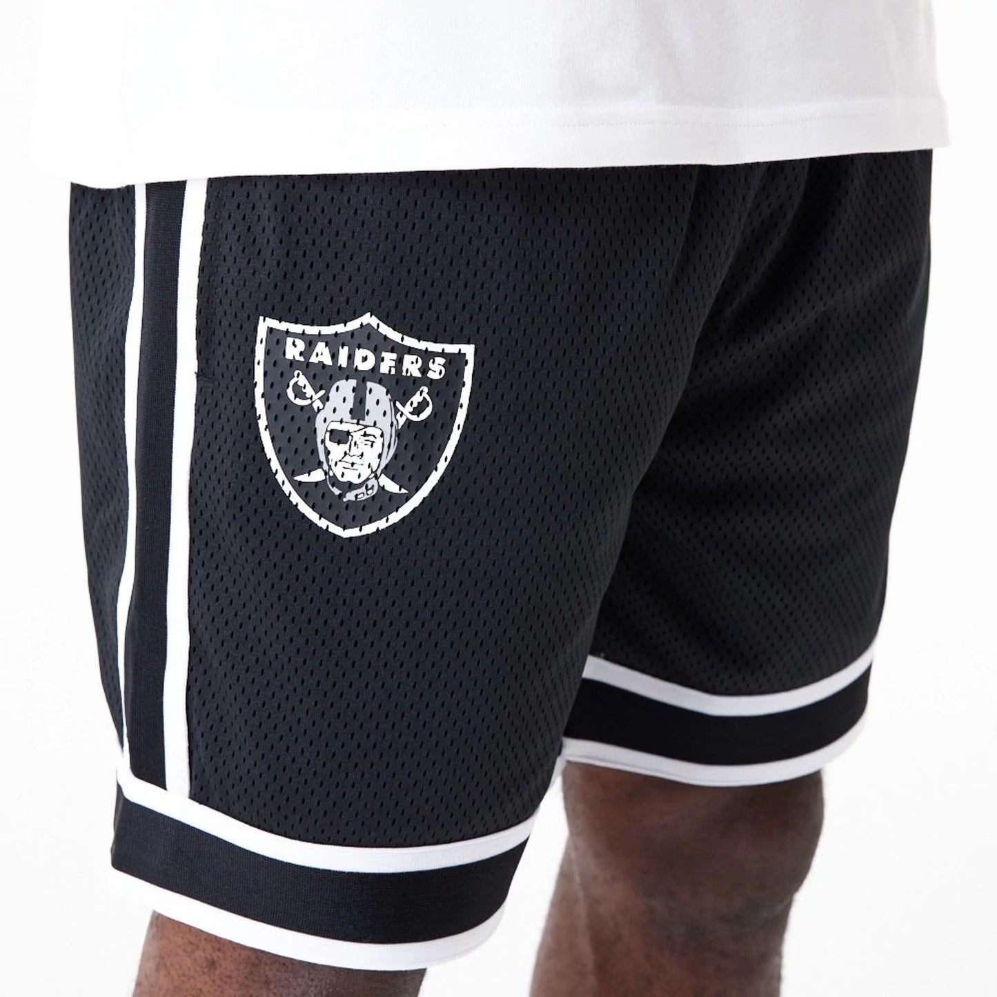 The Male model is wearing Las Vegas Raiders NFL Colour Block Black Shorts 2