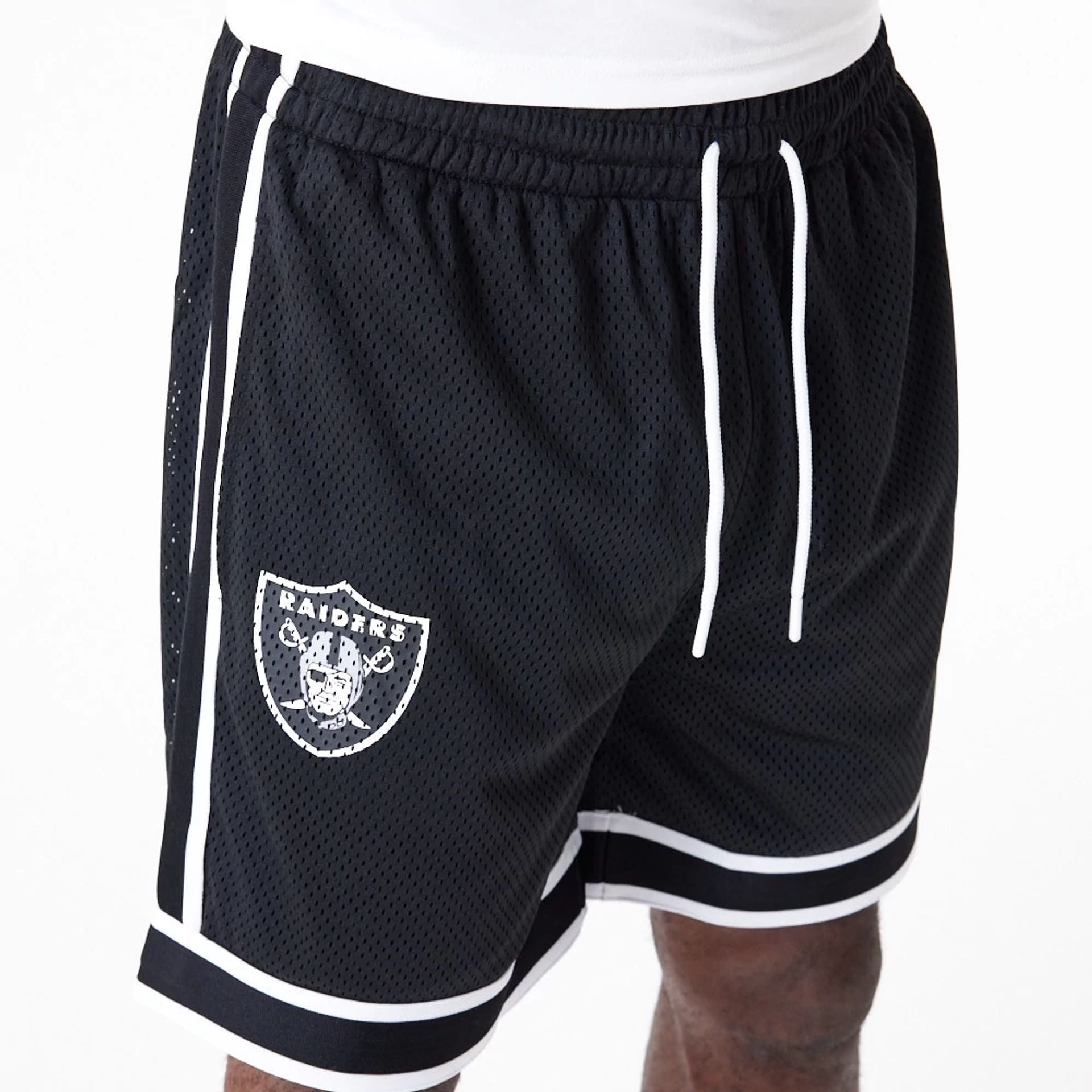 The Male model is wearing Las Vegas Raiders NFL Colour Block Black Shorts 5