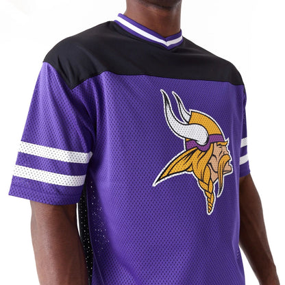 The Male model is wearing Minnesota Vikings NFL Wordmark Graphic Purple T-Shirt 7