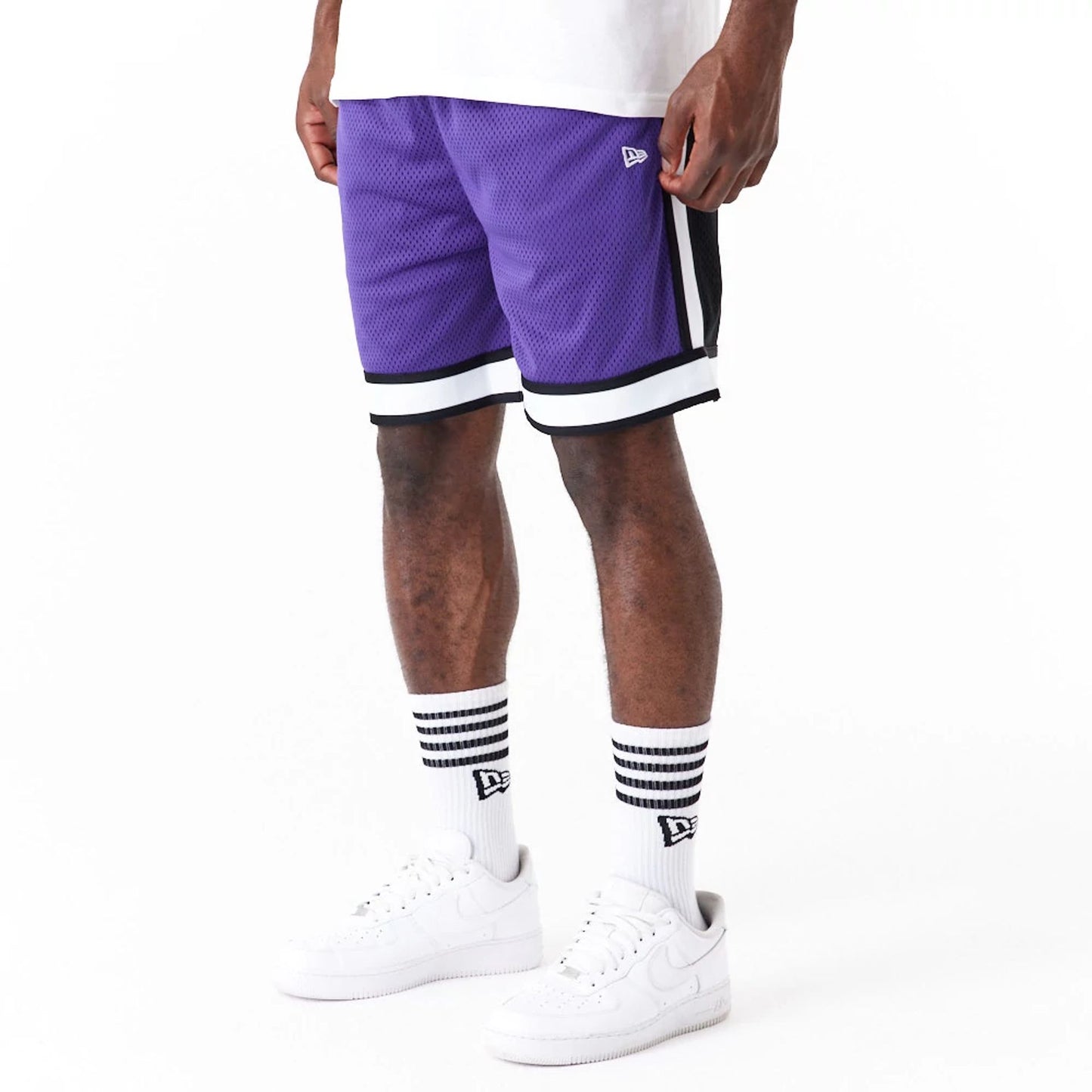 The Male model is wearing Minnesota Vikings NFL Colour Block Purple Shorts 5