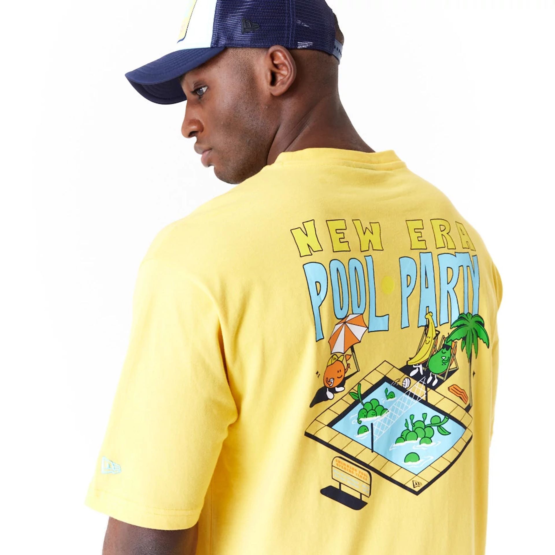 The Male model is wearing New Era Pool Party Fruit Graphic Yellow Oversized T-Shirt 2