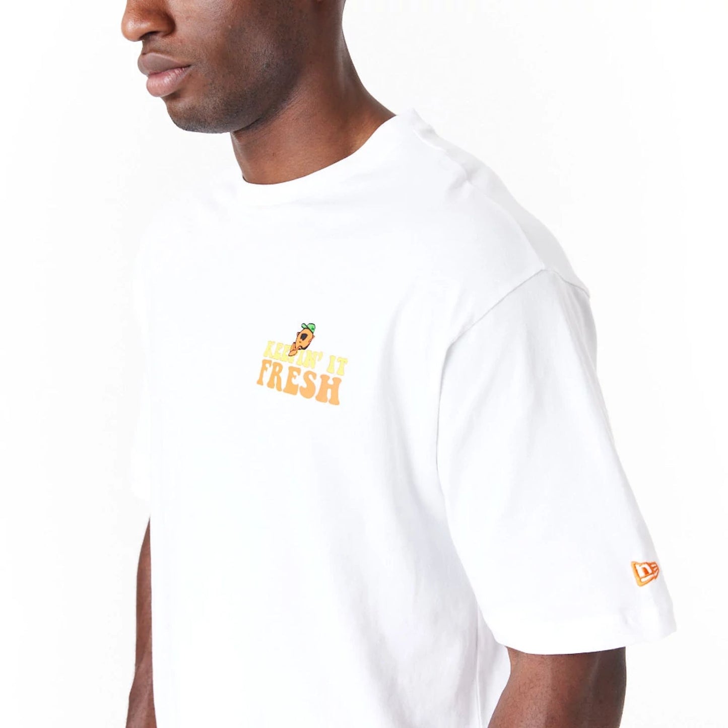 The Male model is wearing New Era Fruit Graphic White Oversized T-Shirt 4