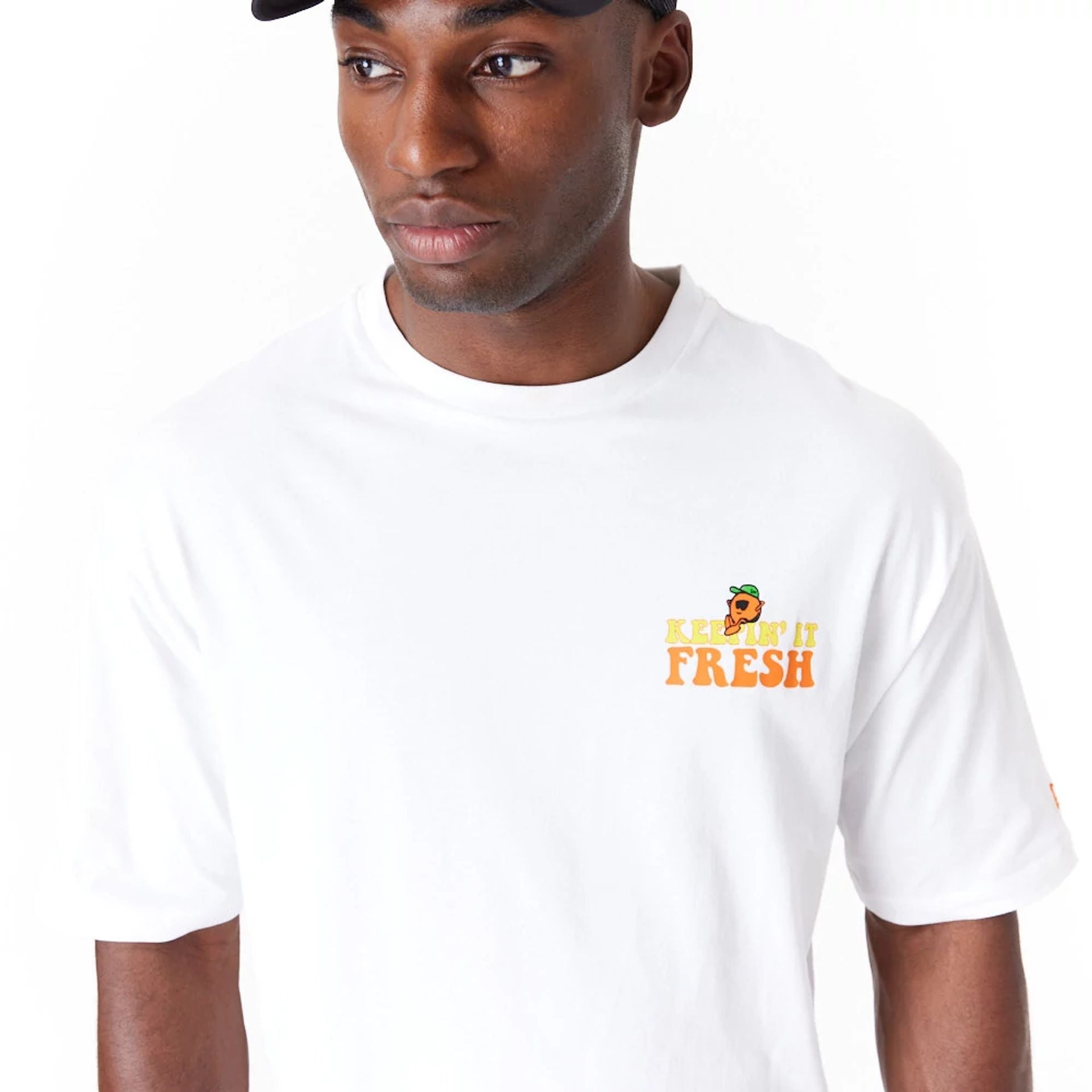 The Male model is wearing New Era Fruit Graphic White Oversized T-Shirt 5