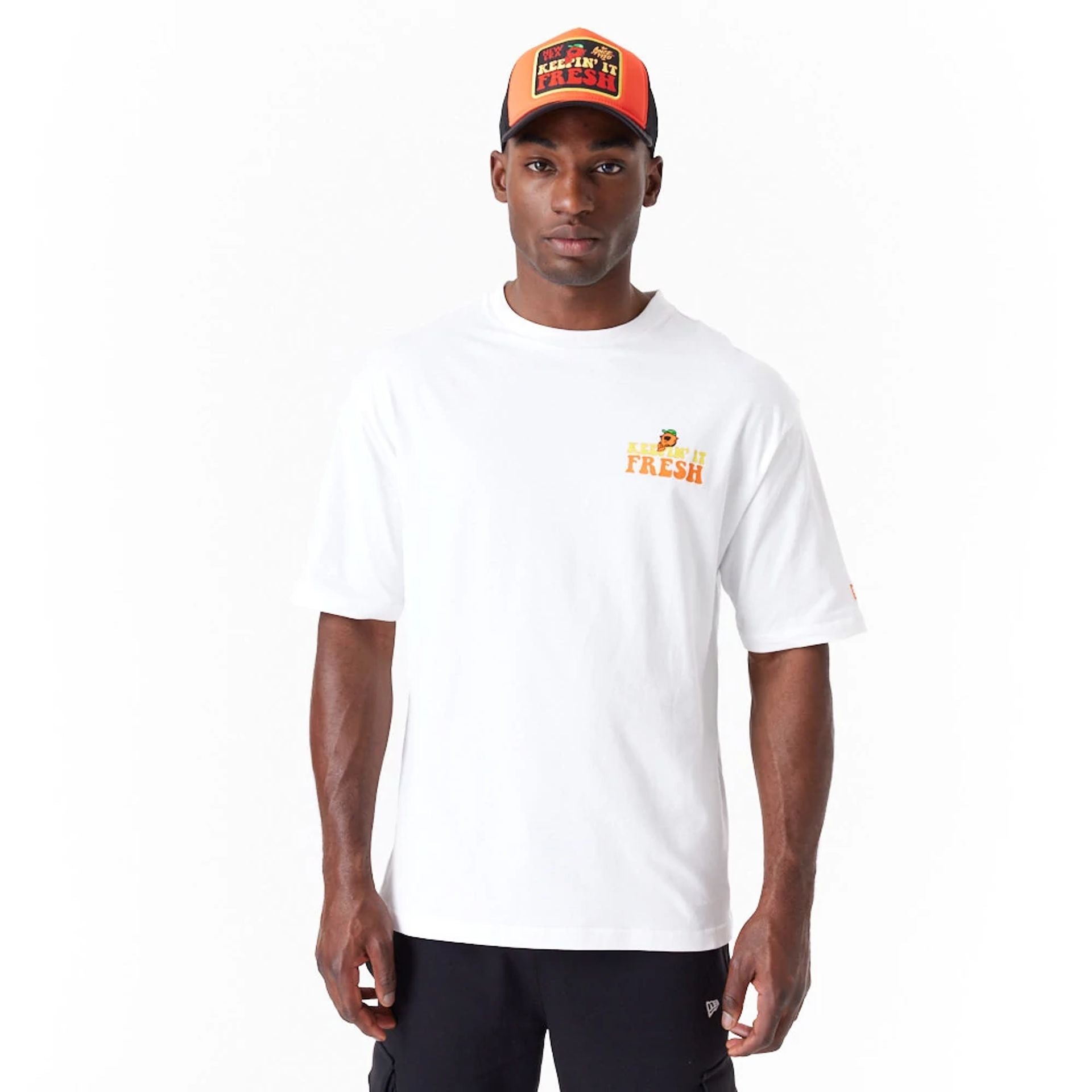 The Male model is wearing New Era Fruit Graphic White Oversized T-Shirt 2