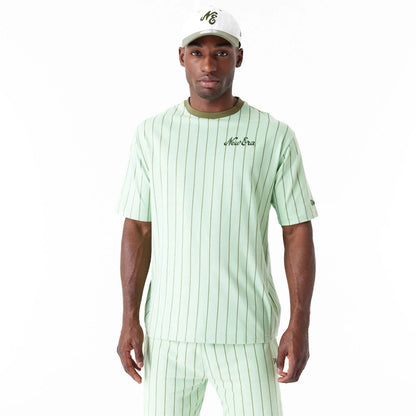 The Male model is wearing New Era Pinstripe Bright Green Oversized T-Shirt 12