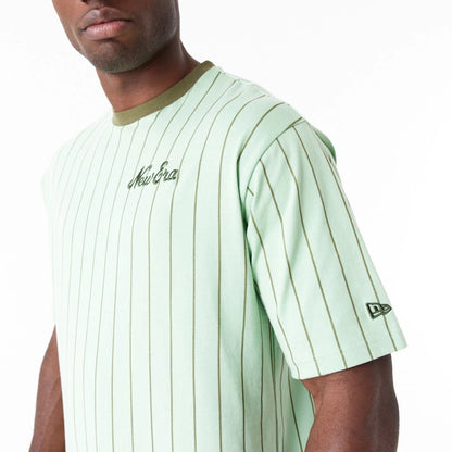 The Male model is wearing New Era Pinstripe Bright Green Oversized T-Shirt 6