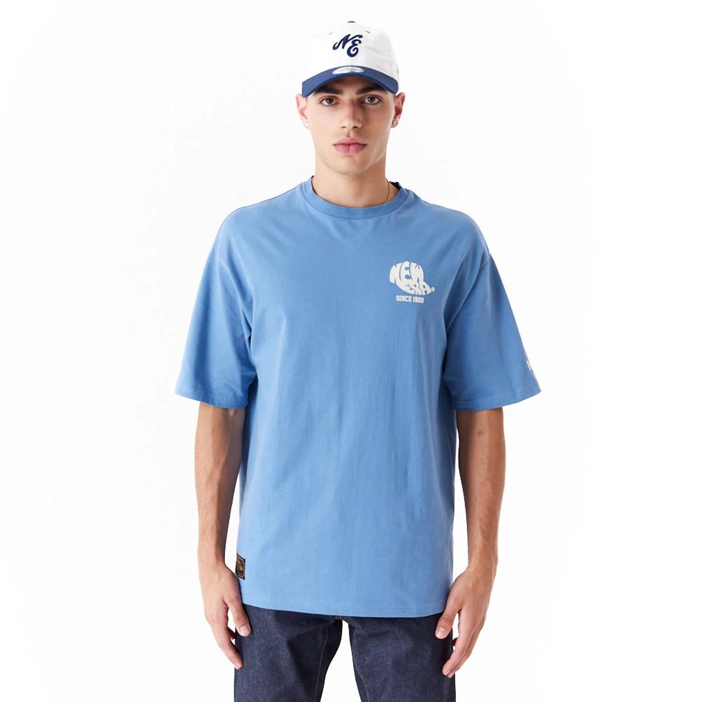 The Male model is wearing New Era Graphic Blue Oversized T-Shirt 8