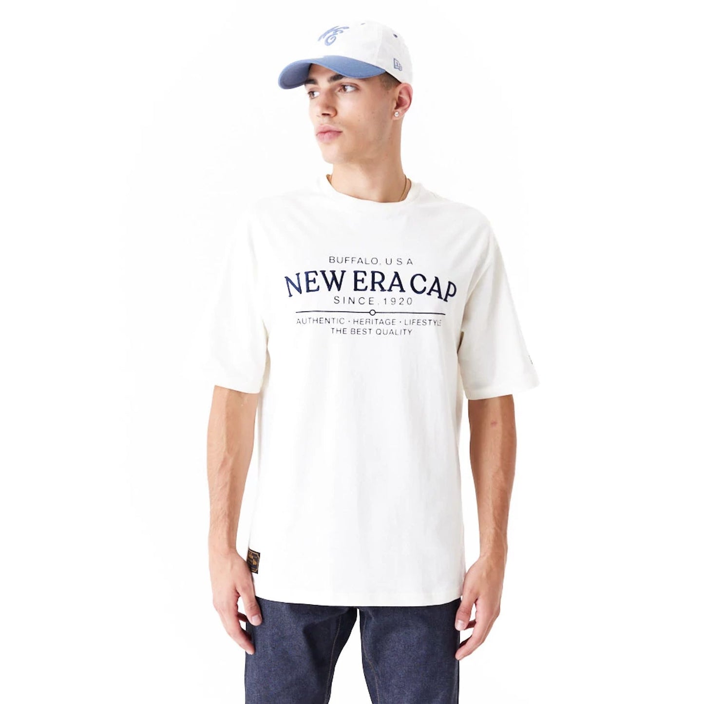 The Male model is wearing New Era Graphic White Oversized T-Shirt 1