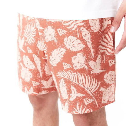 The Male model is wearing New Era All Over Print Brown Woven Shorts 3