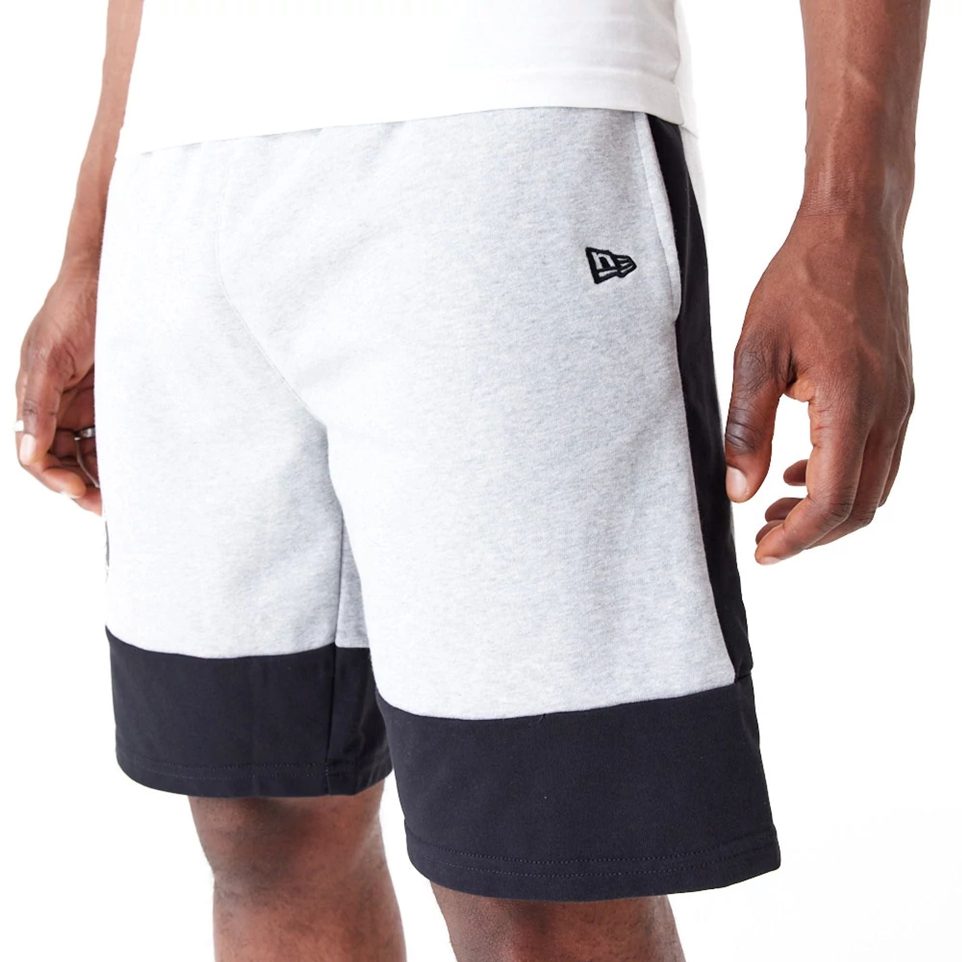 The Male model is wearing Brooklyn Nets NBA Colour Block Grey Shorts 3