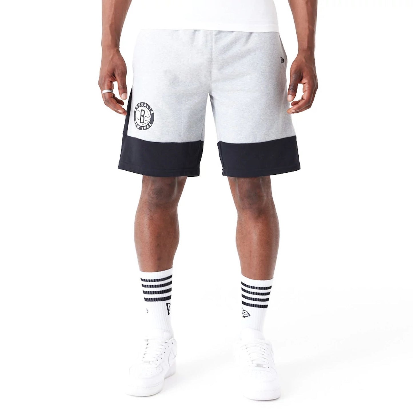 The Male model is wearing Brooklyn Nets NBA Colour Block Grey Shorts 1