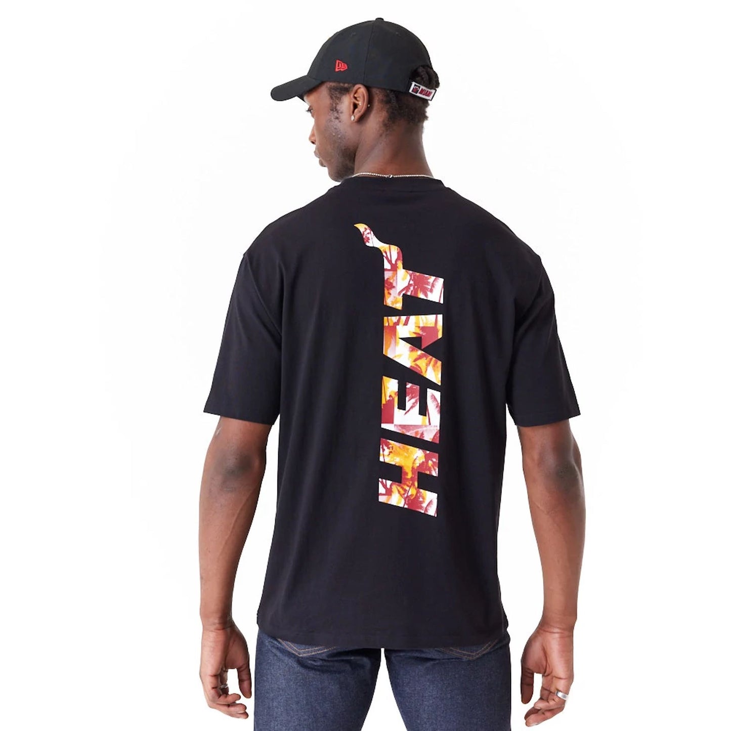 The Male model is wearing Miami Heat NBA Large Infill Black Oversized T-Shirt 6