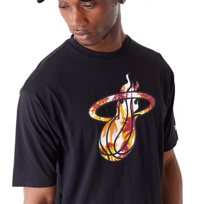 The Male model is wearing Miami Heat NBA Large Infill Black Oversized T-Shirt 4