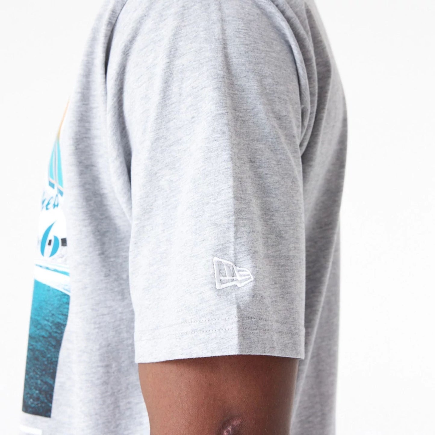 The Male model is wearing Miami Dolphins NFL Team Graphic Grey Oversized T-Shirt 5