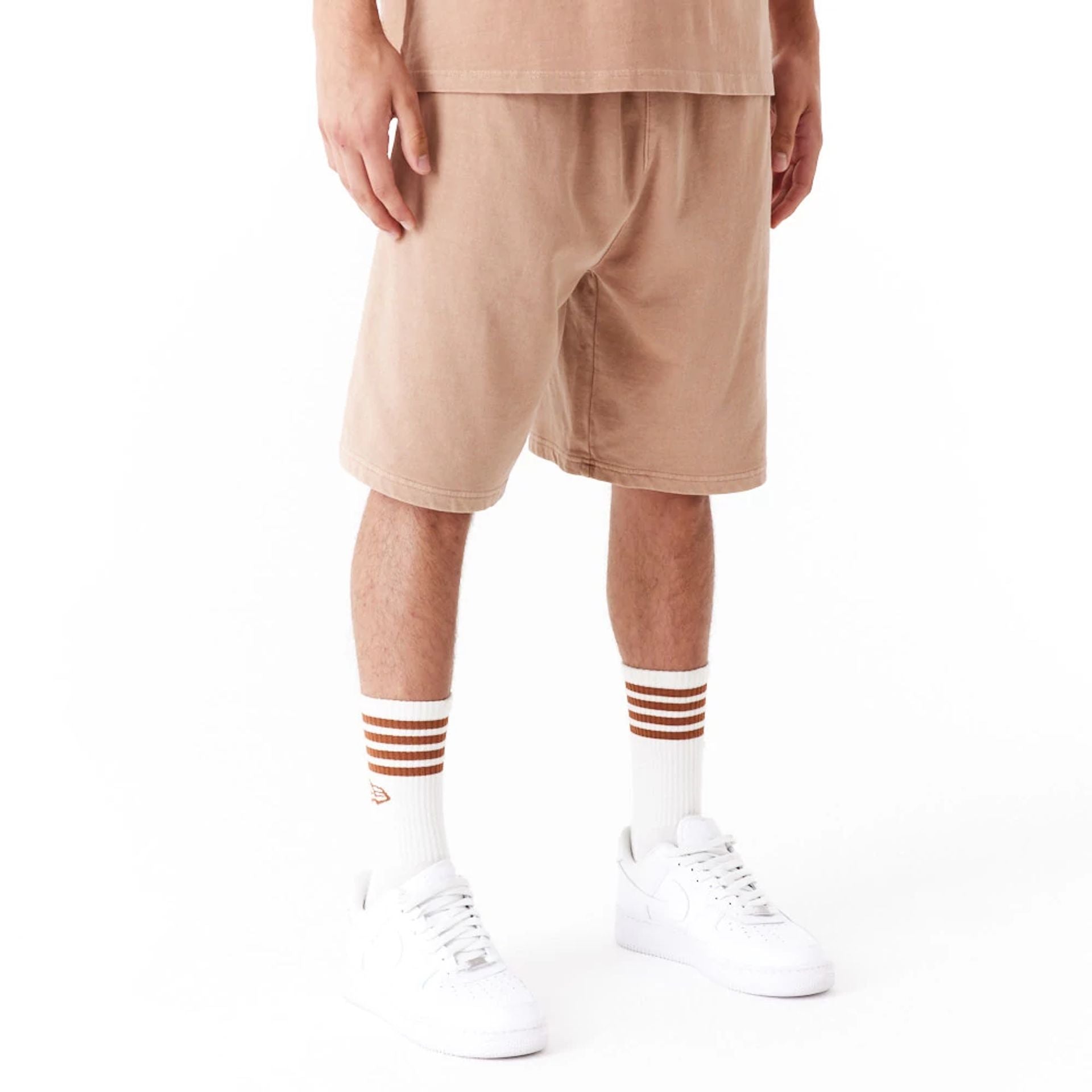 The Male model is wearing New Era Washed Orange Shorts 6