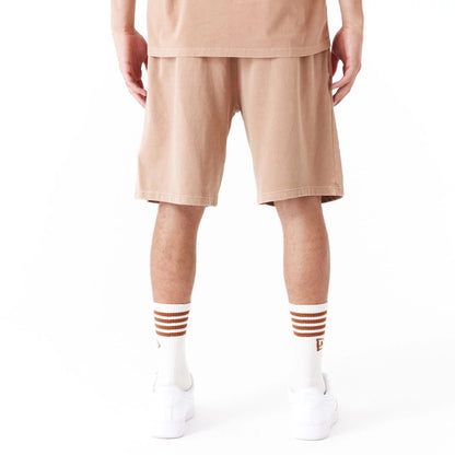 The Male model is wearing New Era Washed Orange Shorts 2