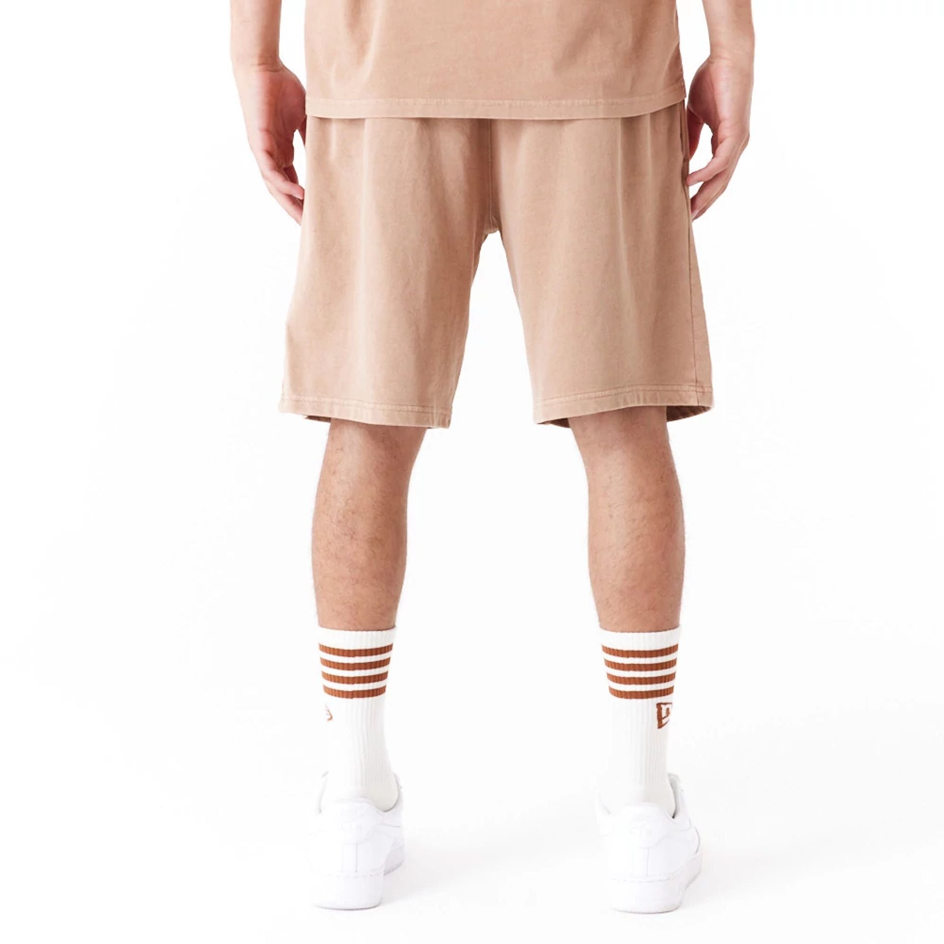 The Male model is wearing New Era Washed Orange Shorts 2