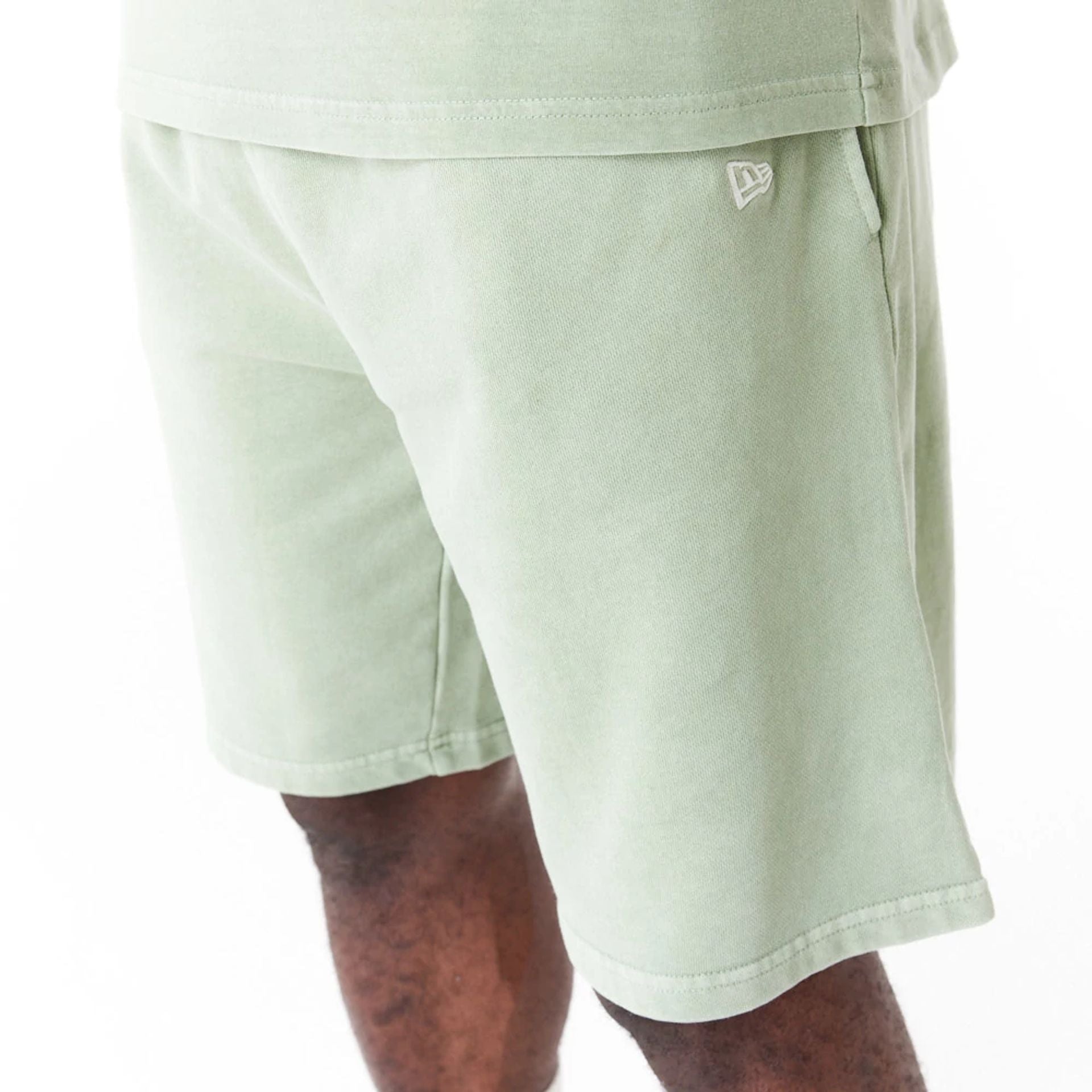 The Male model is wearing New Era Washed Green Shorts 8