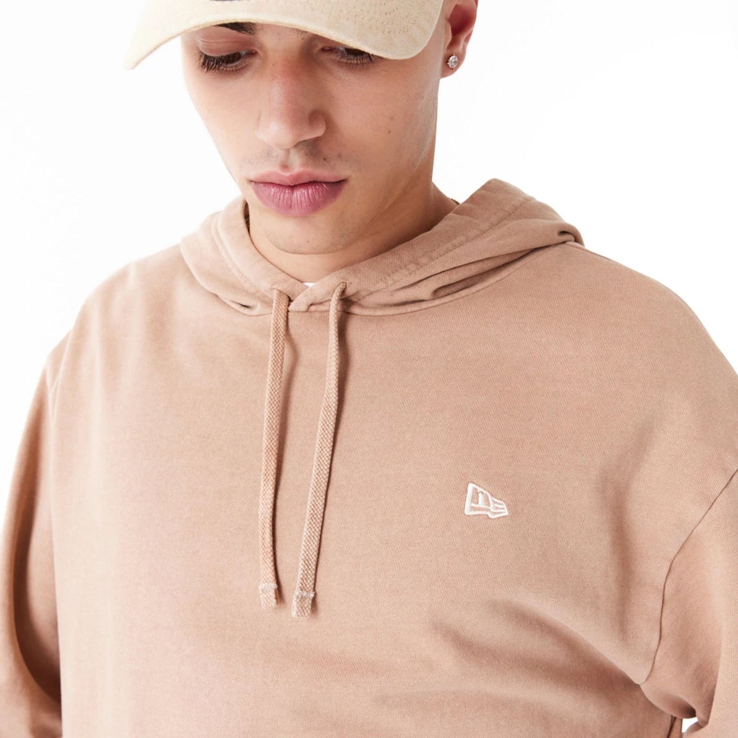 The Male model is wearing New Era Washed Orange Oversized Pullover Hoodie 9