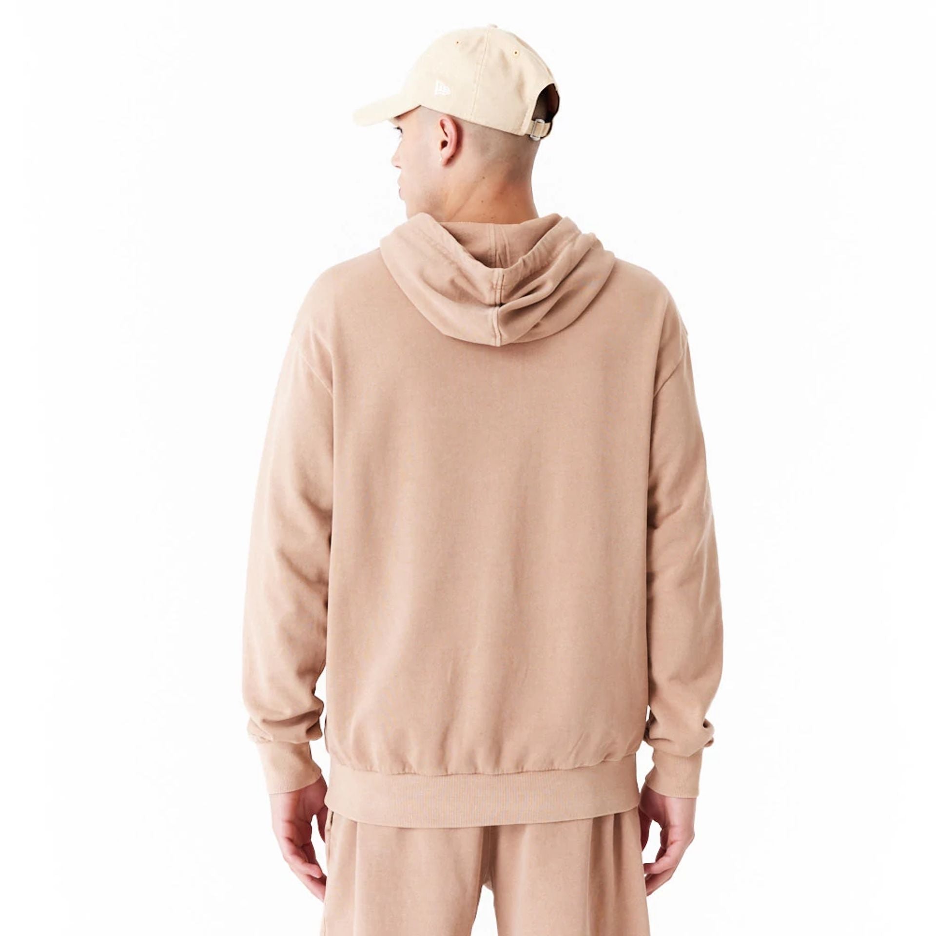 The Male model is wearing New Era Washed Orange Oversized Pullover Hoodie 5