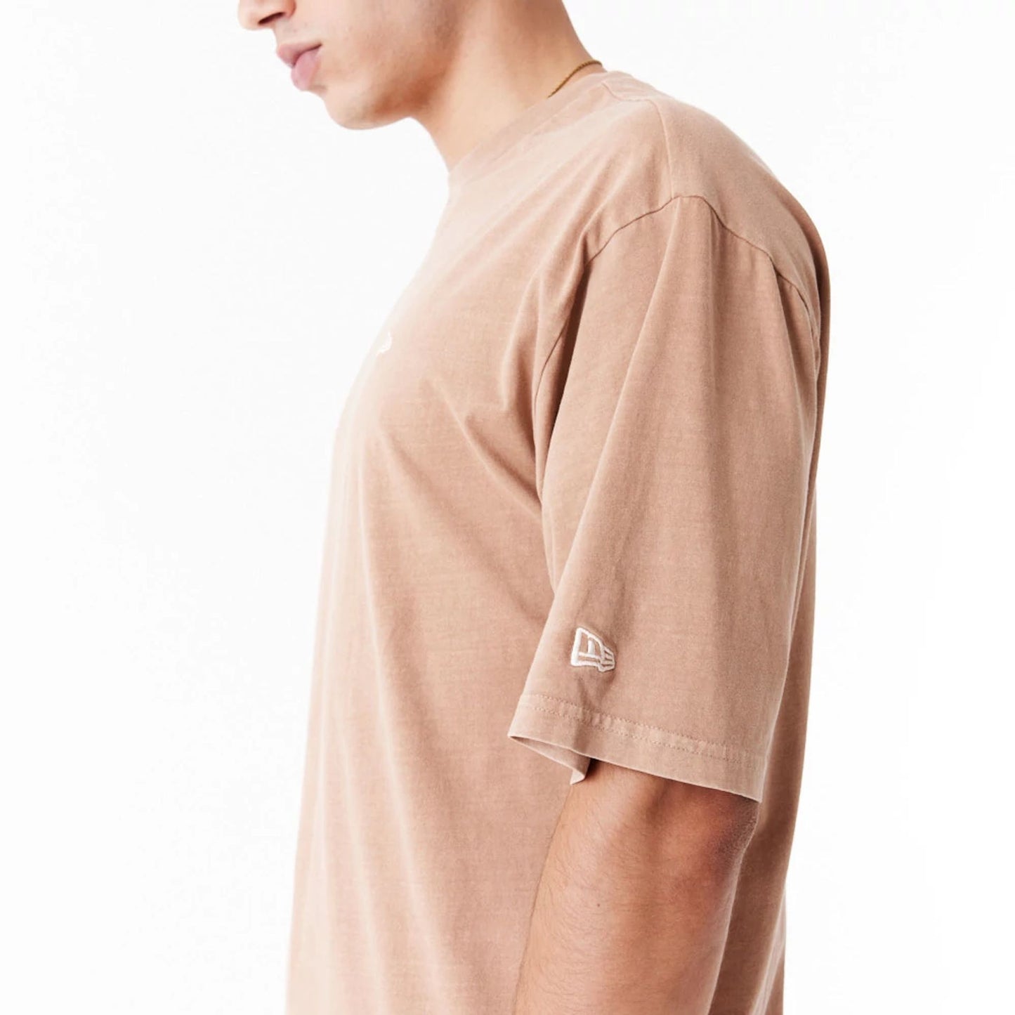 The Male model is wearing New Era Washed Orange Oversized T-Shirt 5