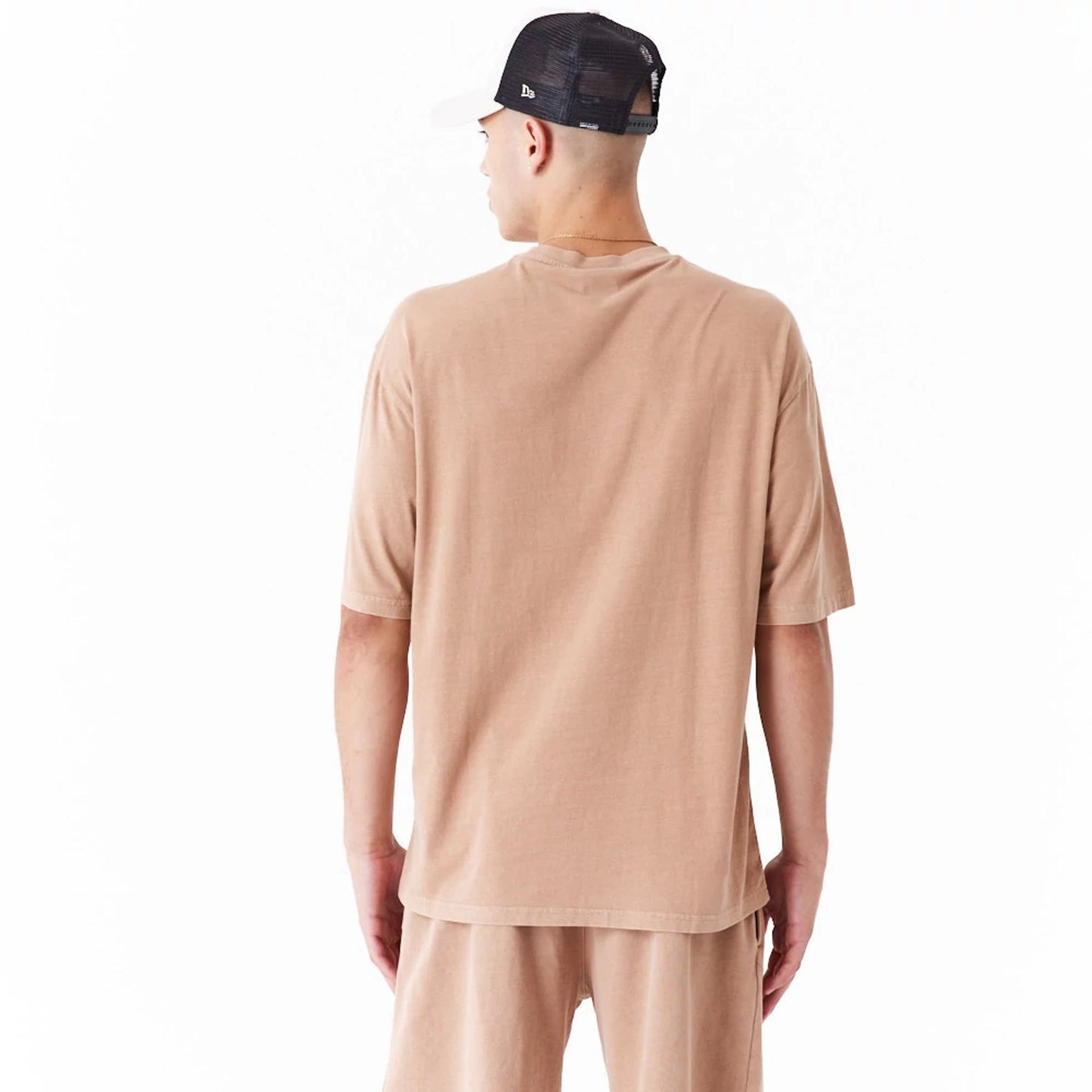 The Male model is wearing New Era Washed Orange Oversized T-Shirt 9