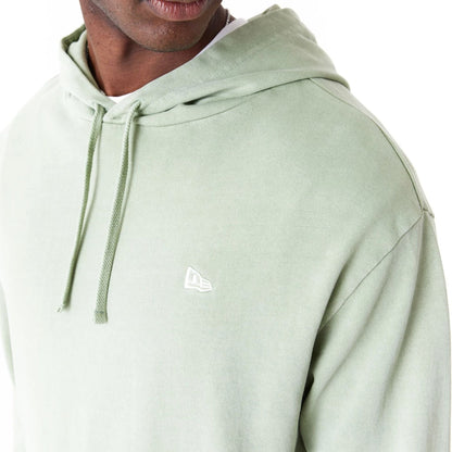 The Male model is wearing New Era Washed Green Oversized Pullover Hoodie 10