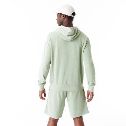 The Male model is wearing New Era Washed Green Oversized Pullover Hoodie 7