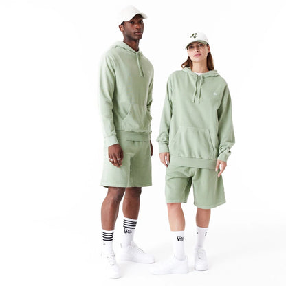 The Male model is wearing New Era Washed Green Oversized Pullover Hoodie 8