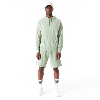 The Male model is wearing New Era Washed Green Oversized Pullover Hoodie 5