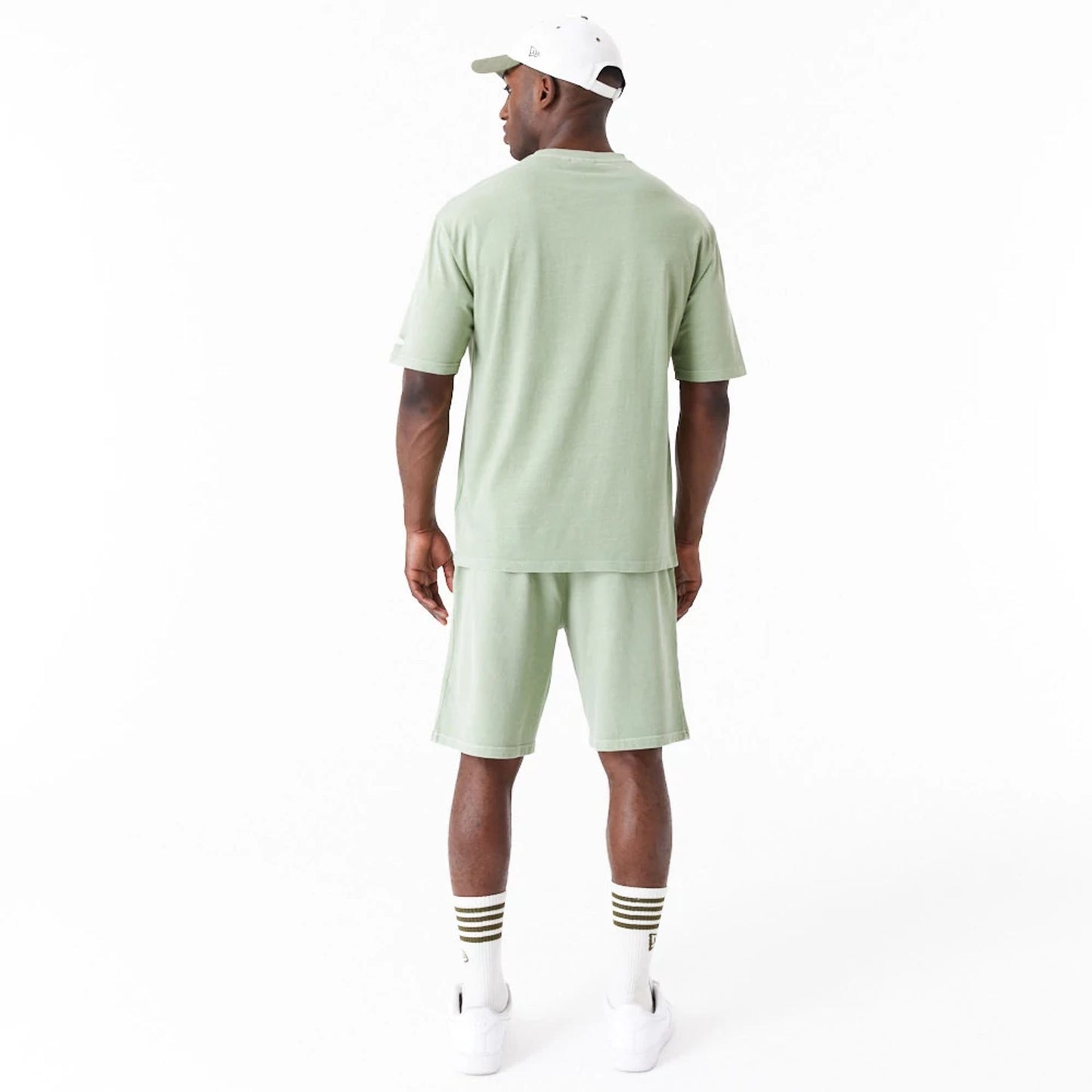 The Male model is wearing New Era Washed Green Oversized T-Shirt 6