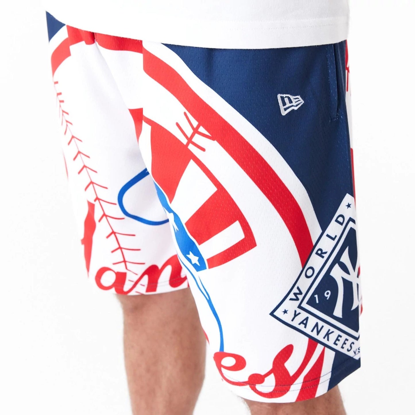 The Male model is wearing New York Yankees MLB Large Logo Dark Blue Shorts 3