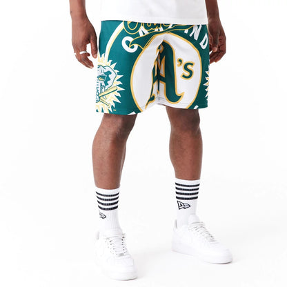 The Male model is wearing Oakland Athletics MLB Large Logo Dark Green Shorts 1