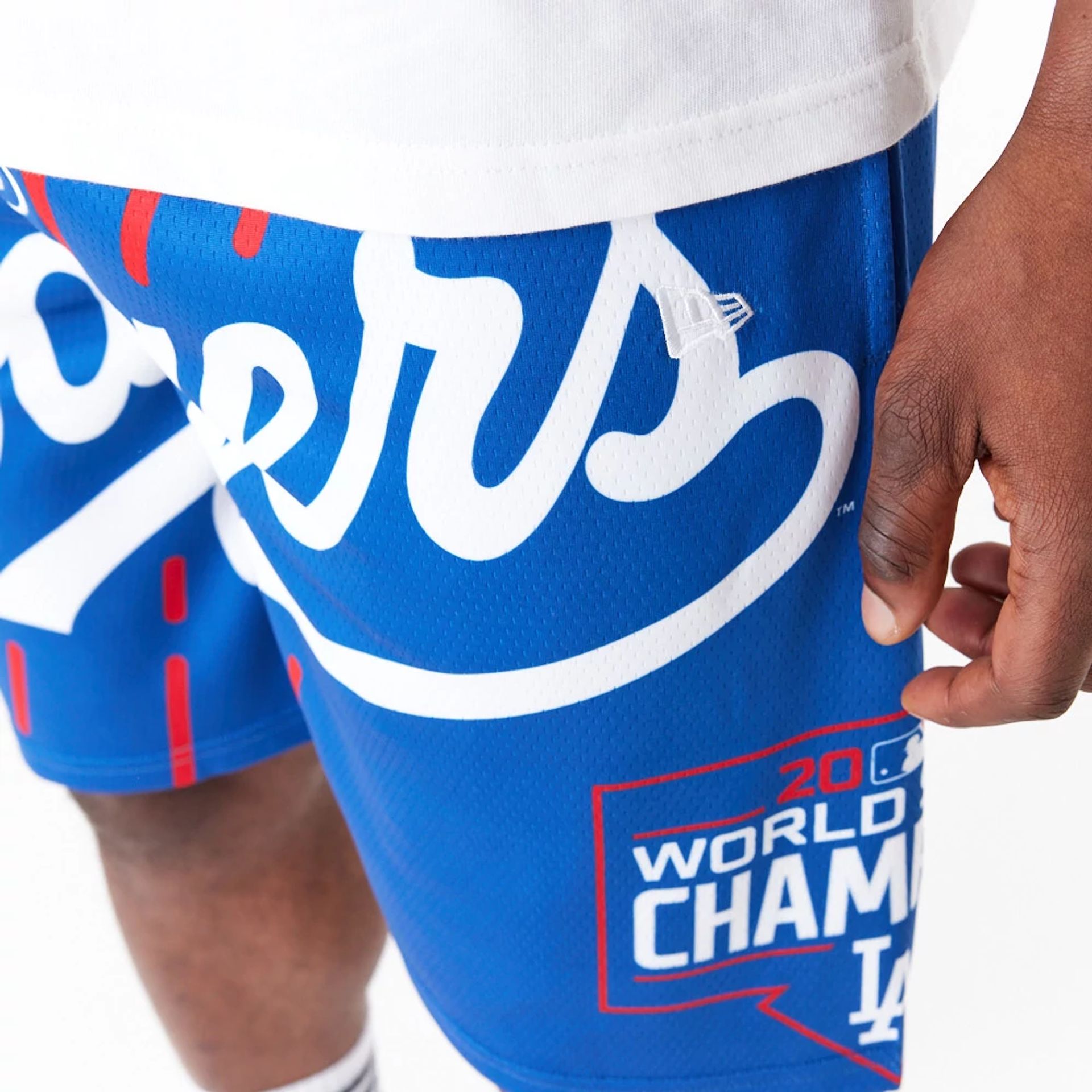 The Male model is wearing LA Dodgers MLB Large Logo Blue Shorts 3