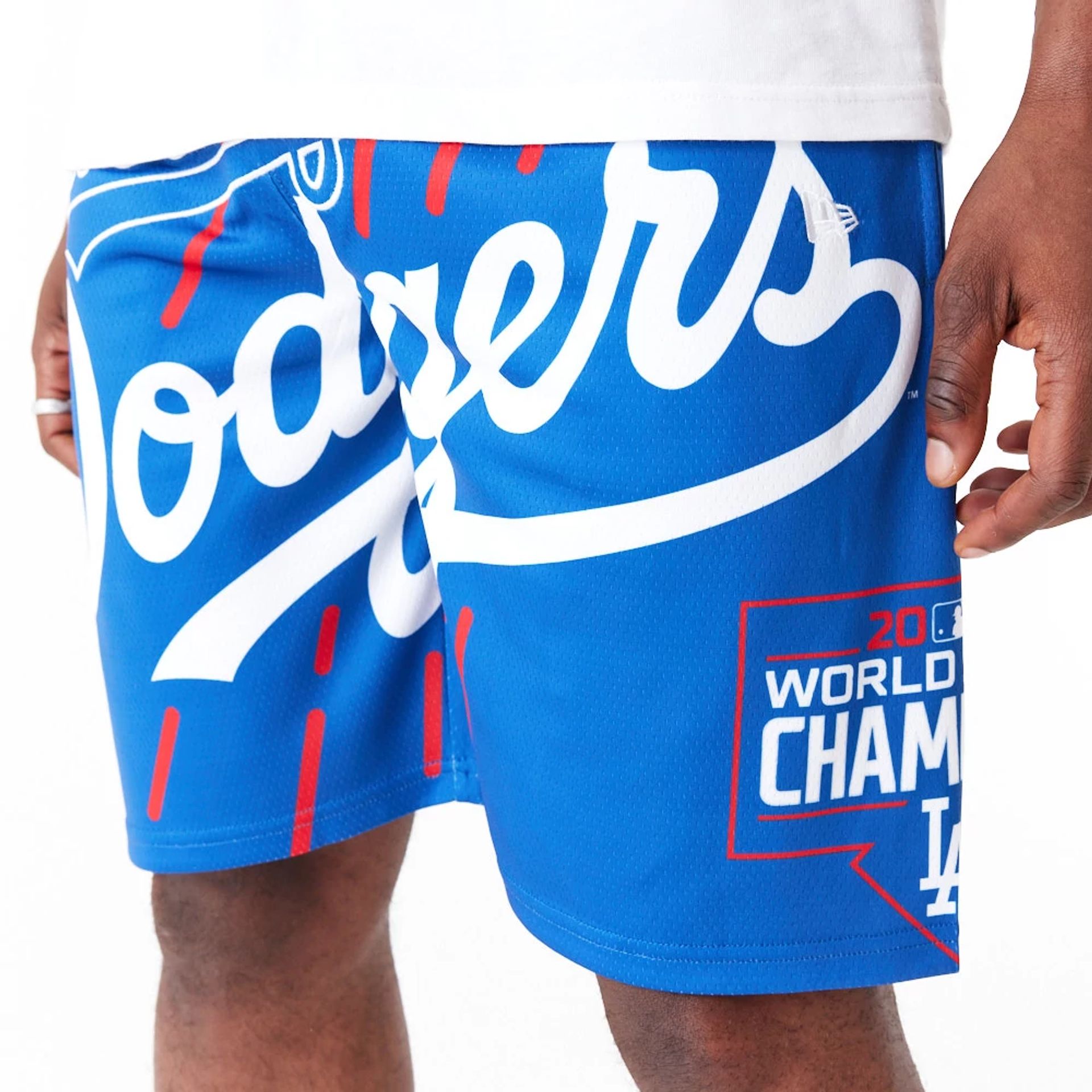 The Male model is wearing LA Dodgers MLB Large Logo Blue Shorts 7