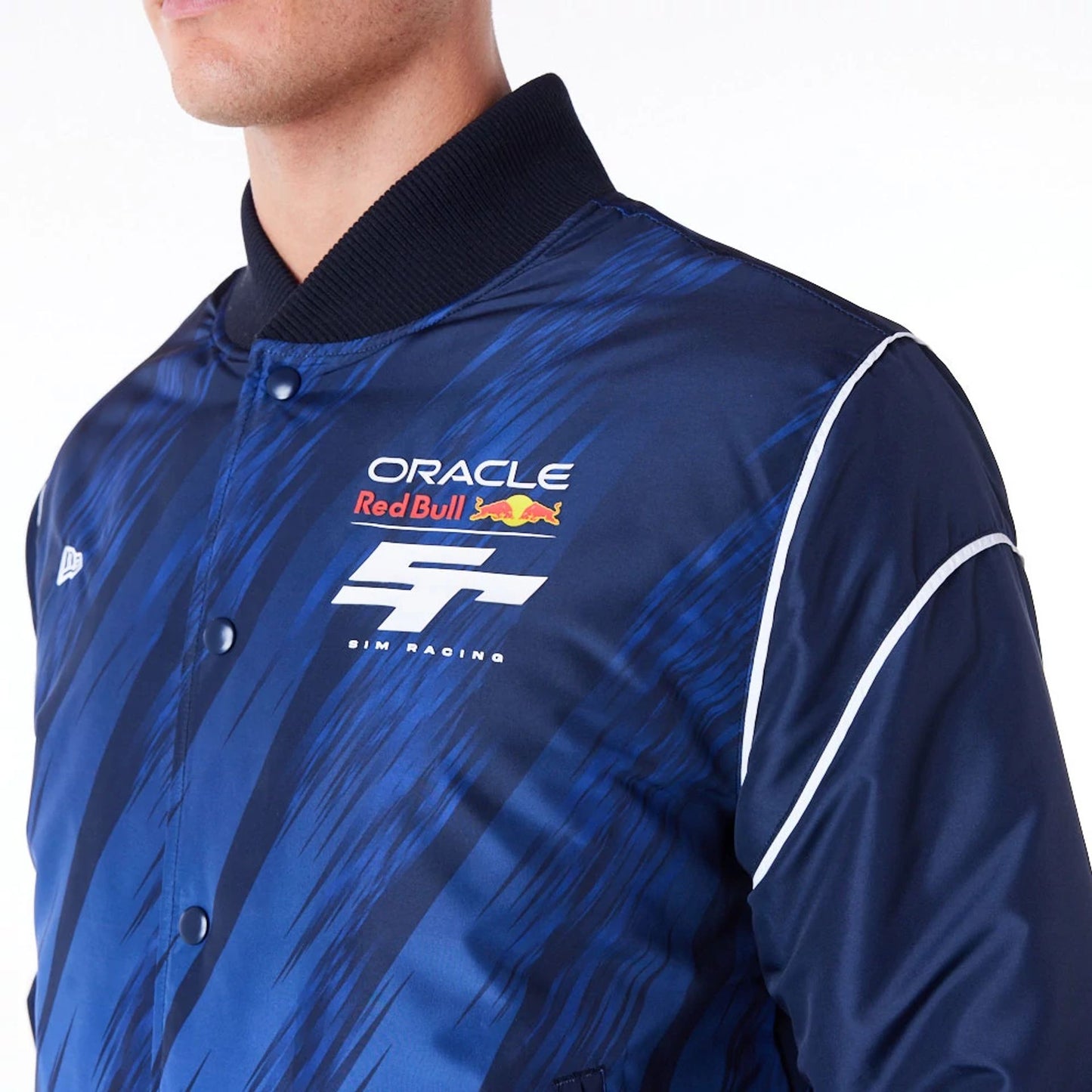 The Male model is wearing Red Bull Sim Racing Navy Bomber Jacket 5