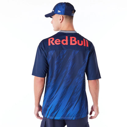 The Male model is wearing Red Bull  Sim Racing Navy V Neck Jersey 2