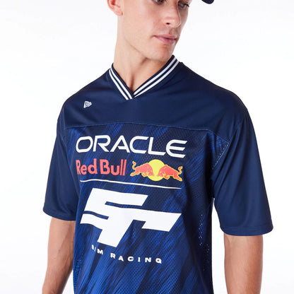 The Male model is wearing Red Bull  Sim Racing Navy V Neck Jersey 6