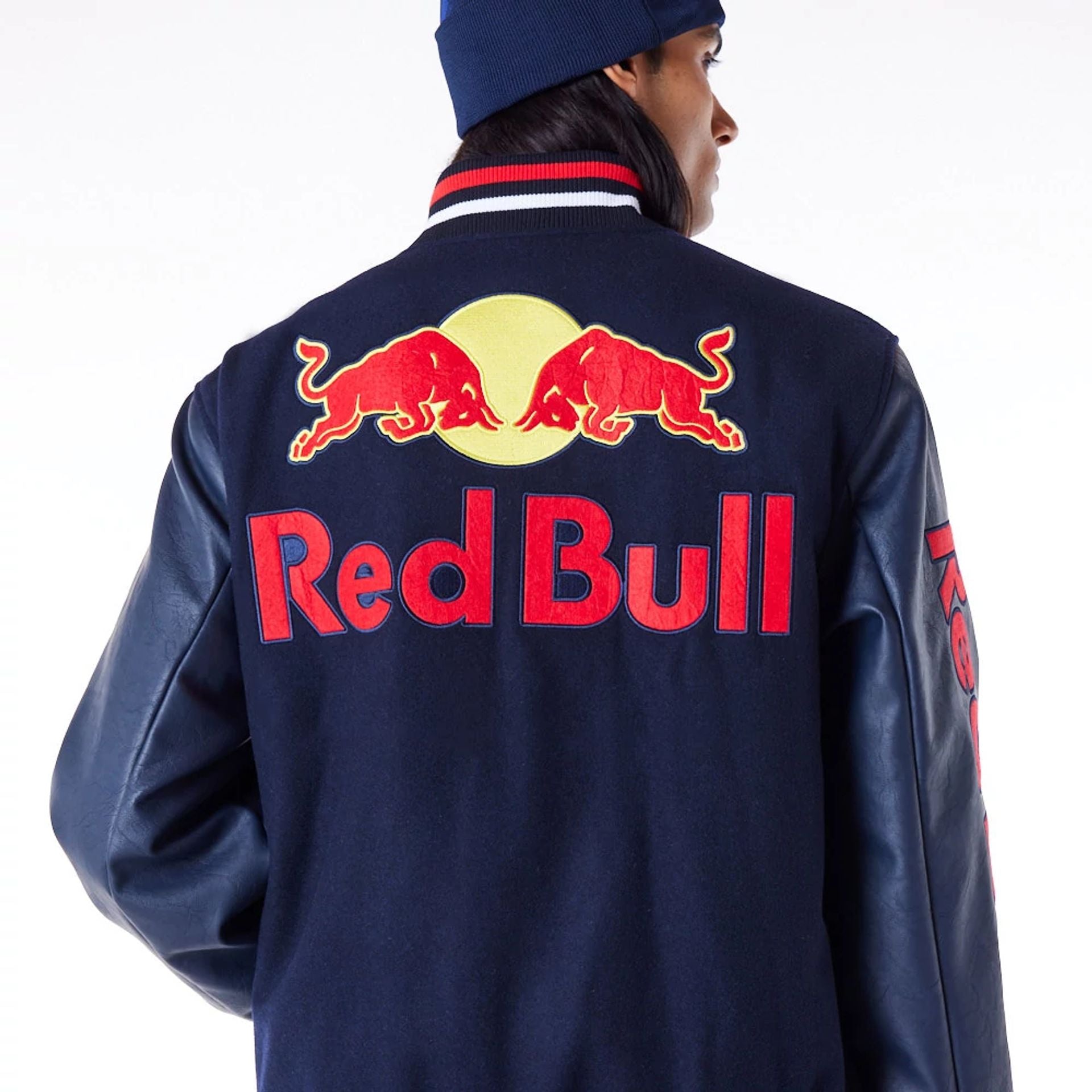 The Male model is wearing Red Bull Sim Racing Navy Varsity Jacket 8